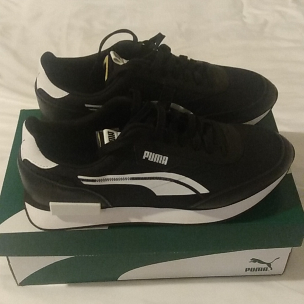 Men's puma sneakers size 9 worn litterally one time. 9.5/10 condition.no scuffs